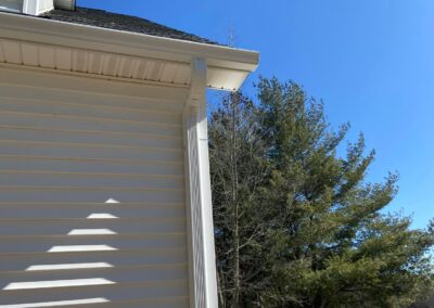 seamless gutters on white house