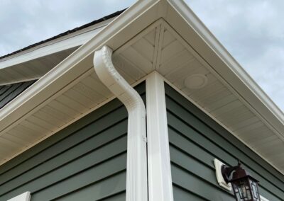 white seamless gutters with leafguards