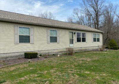 gray seamless gutters with leaf guards