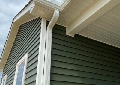 white seamless gutters with leaf guards